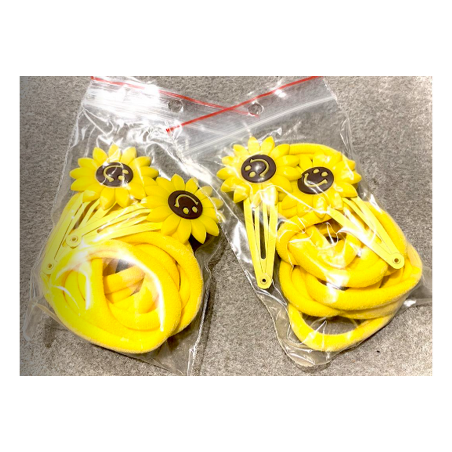 P-G-3887  Gumytės plaukams, geltonos 10 vnt, 2 vnt segtukai ramunės su šypsenėle.