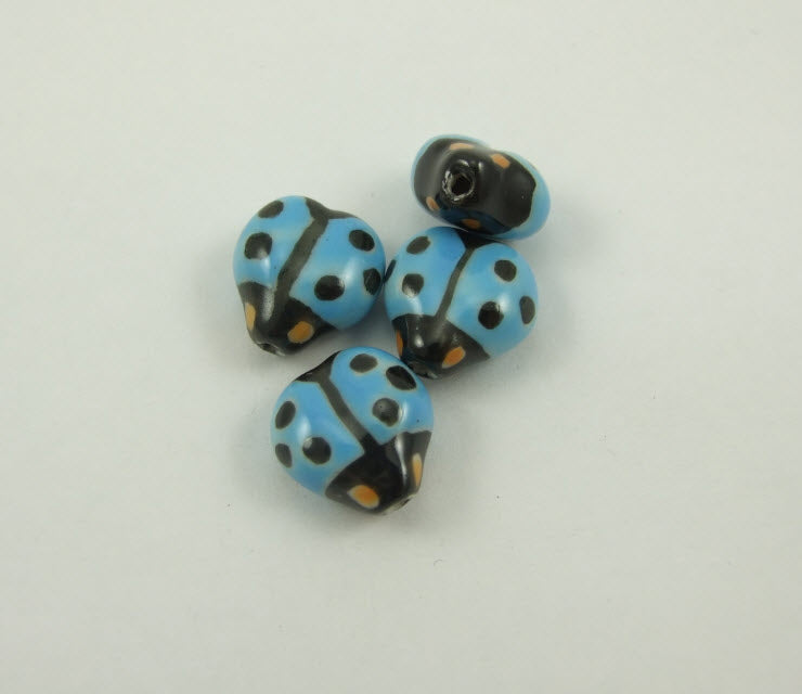 11-05971 porcelianinė boružėlė, 16x15mm, melsva
