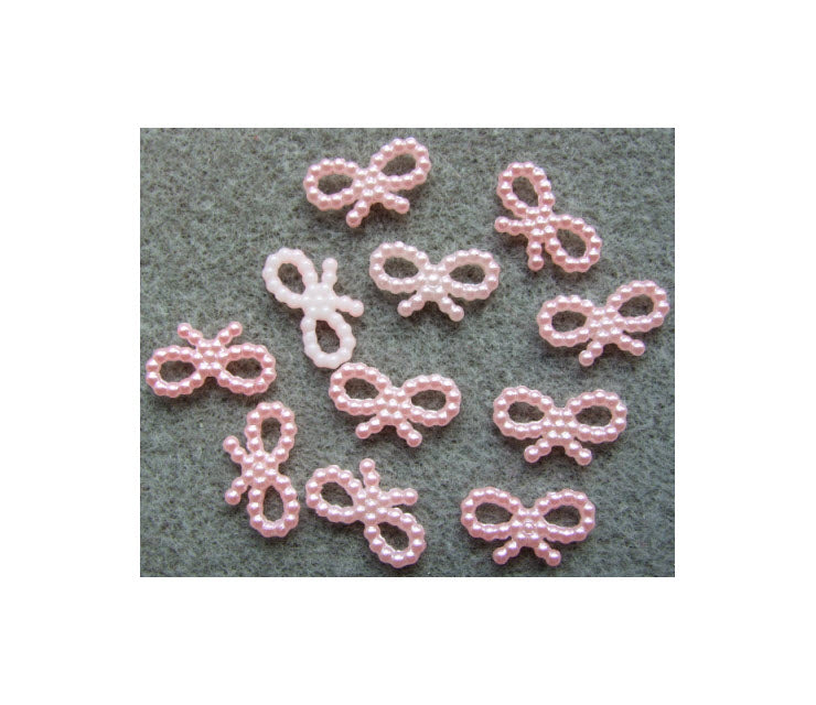 AK-AP351019 Akrilinė aplikacija "Bantukas", (prisiuvama, klijuojama), 10x18mm, rausva