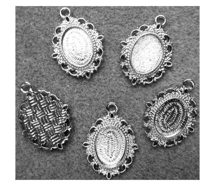 SID-RM18 Rėmelis kabošonui 18x13mm, sidabro sp. , 27x35mm