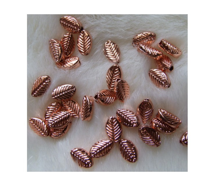 ROZ-AUK10722 Karoliukas, 10x6mm, "Lapelis ", rož., aukso sp.