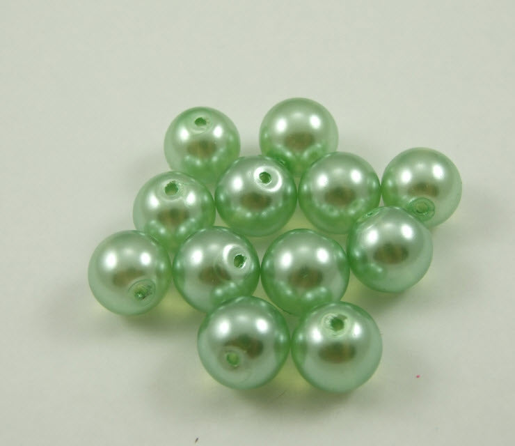 P-5542 Stiklinis perliukas, 14mm, skaidriai žalsvas